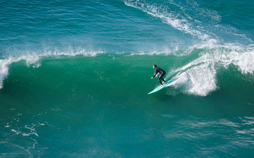 Man surfing in sea