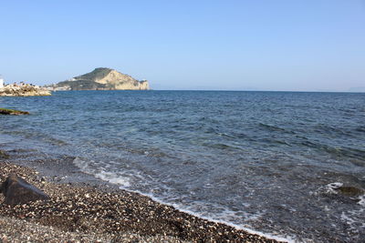 Scenic view of sea against clear sky