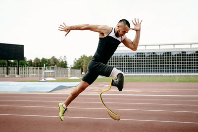 Full length of man running