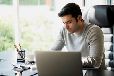 Man working on table