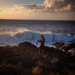 Scenic view of sea at sunset