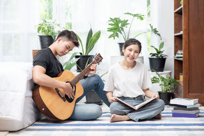 Young man playing guitar