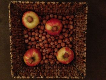 High angle view of apples in basket on table