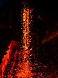 Close-up of illuminated lights in water at night