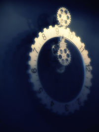 Close-up of circular object on wall