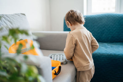 Funny toddler boy playing a game. high quality photo