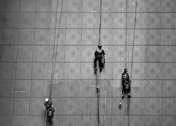 High angle view of people walking on wall