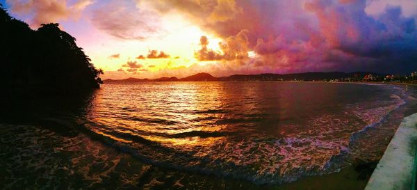 Scenic view of sea against sky at sunset