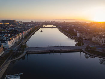 High angle view of bridge over river during sunset