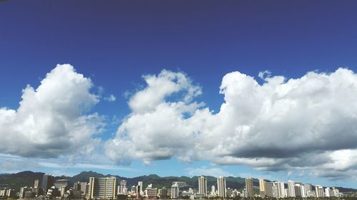 Low angle view of building against blue sky