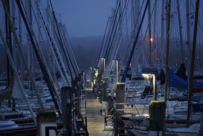 Sailboats in city during summer at night