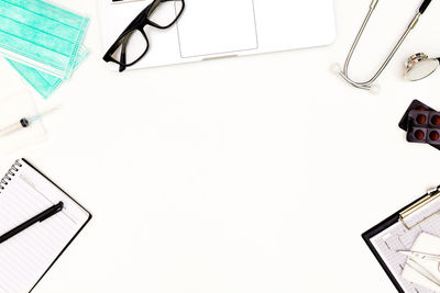 High angle view of pen on table against white background