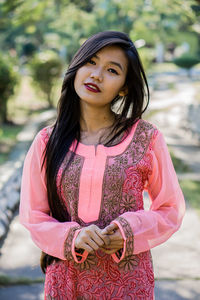 Portrait of a smiling young woman