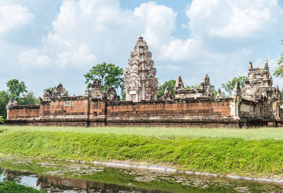 Exterior of old temple against building