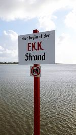 Warning sign on sea