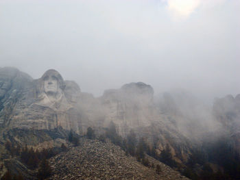 Scenic view of rocky mountains against sky