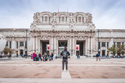 Group of people in front of historical building