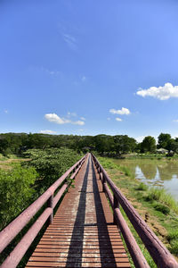 View of bridge on landscape against sky
