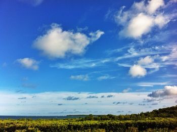 Scenic view of landscape against cloudy sky