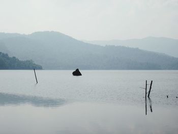 Scenic view of sea against mountains