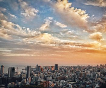Aerial view of city at sunset