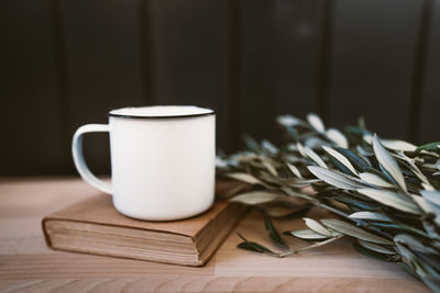 Close-up of coffee cup on table