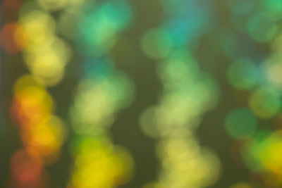 Defocused image of illuminated blurred background