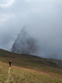 Scenic view of land against sky