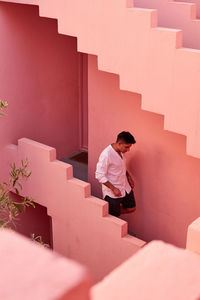 Woman standing on staircase