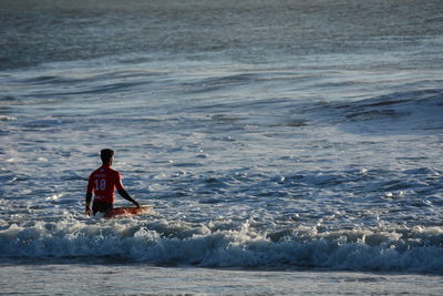 Man surfing in sea