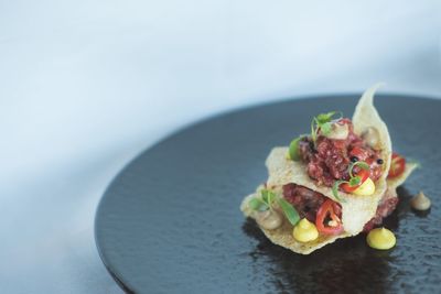 Close-up of breakfast served on table