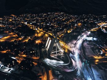 High angle view of illuminated city at night