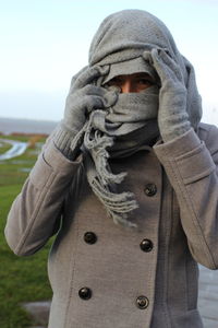 Close-up of woman standing on snow