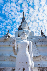 Statue of buddha against sky