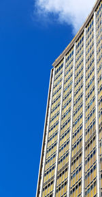 Low angle view of building against blue sky