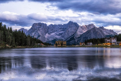 The view of lake misurina and mount sorapiss sunrise view taken during summer. dolomite, italy.