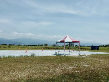 Built structure on beach against sky