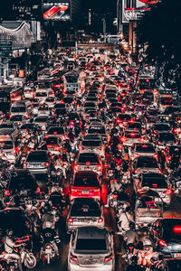 High angle view of vehicles on road in city