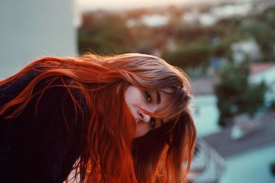 Portrait of beautiful young woman outdoor