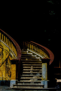 Low angle view of staircase at night