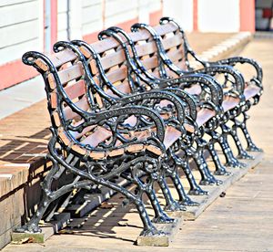 Close-up of empty chairs on table