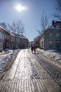 People walking on street in town