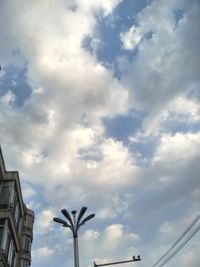 Low angle view of street light against sky