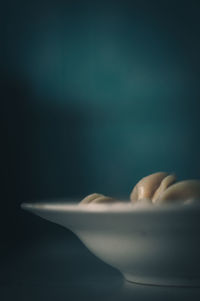 Close-up of human eye against black background