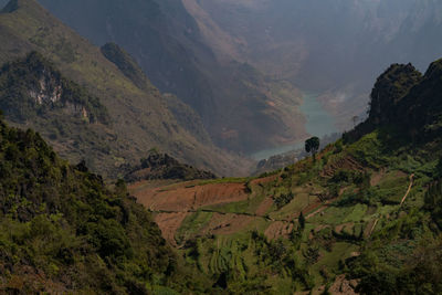 High angle view of land against mountains