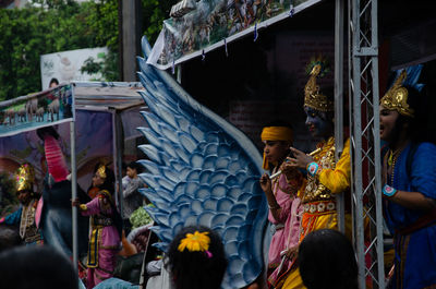 People at street market in city