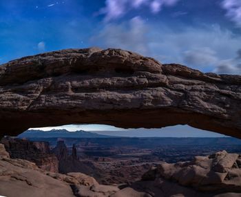 Low angle view of rock formations against sky