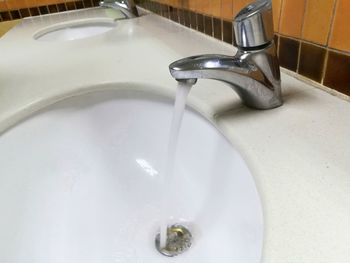 High angle view of faucet in bathroom
