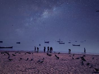 Scenic view of landscape against sky at night