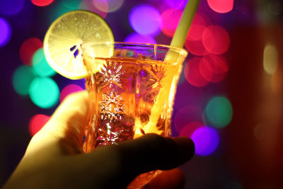 Make cocktail drinks during the holidays and bokeh background